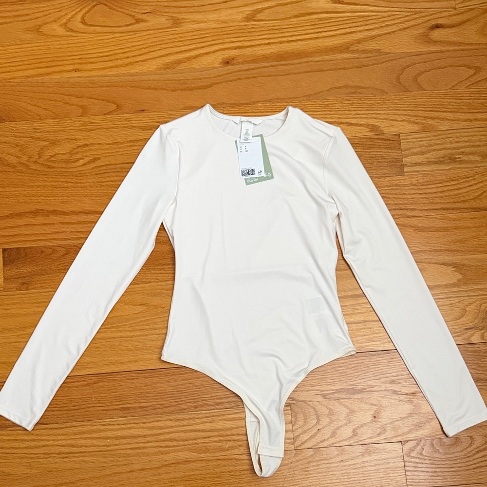 NWT - H&M Cream Long Sleeve Bodysuit